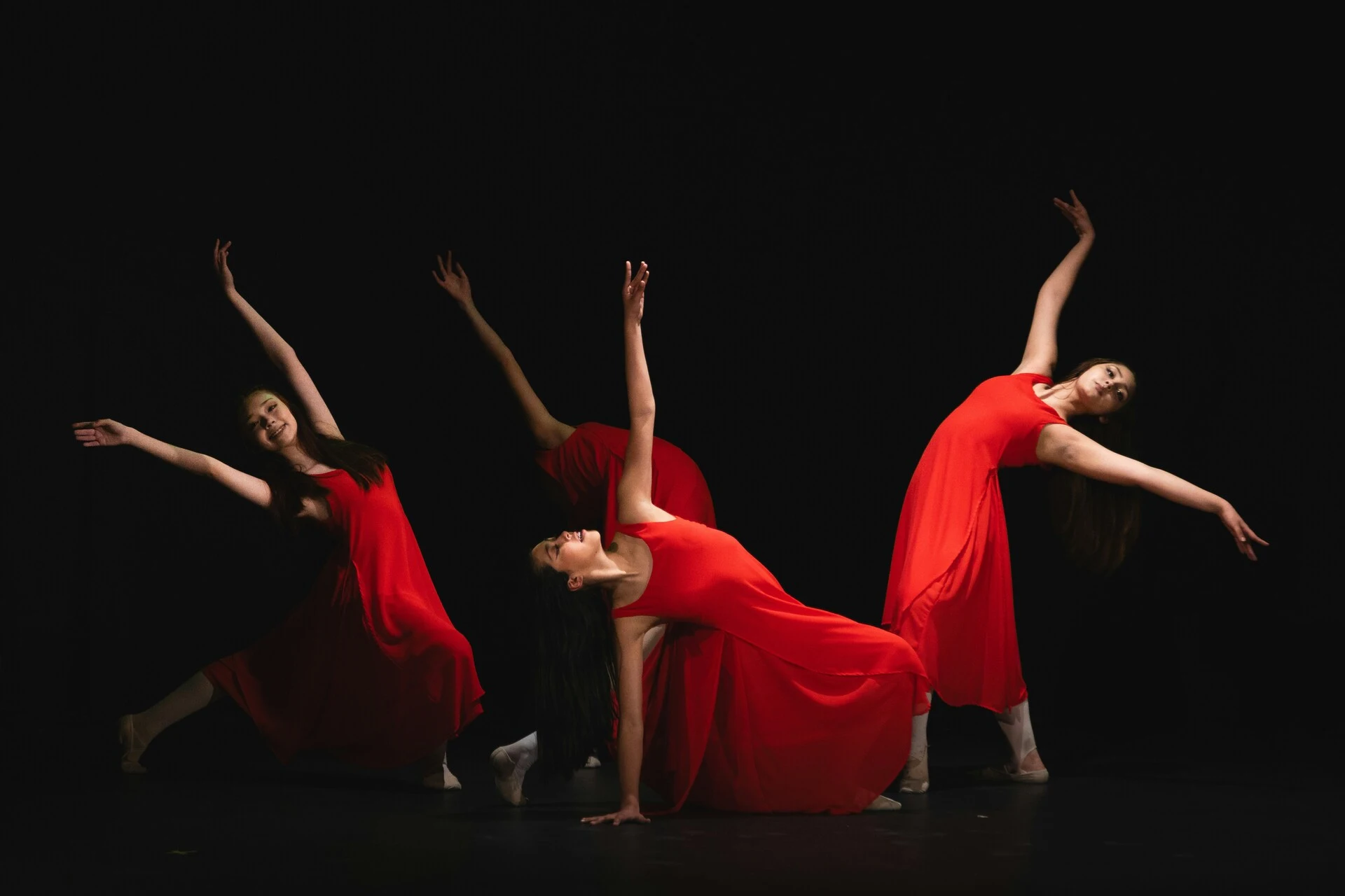 Close view of ballroom footwork and fabric in motion